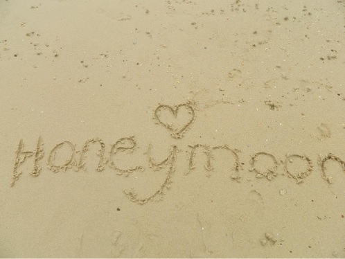 Honeymoon in den Sand geschrieben